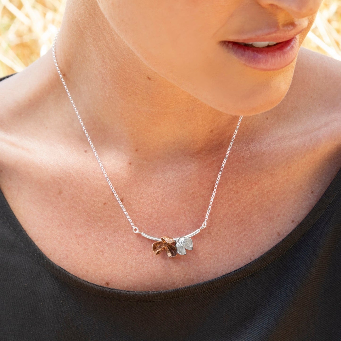 Spikethorn Curved Bar Necklace - 2 pods on model