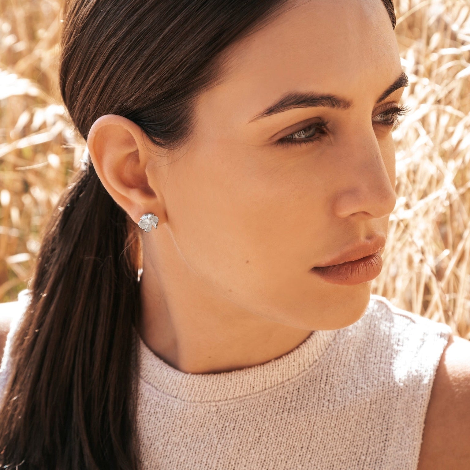 Small Silver Spikethorn Studs on Model