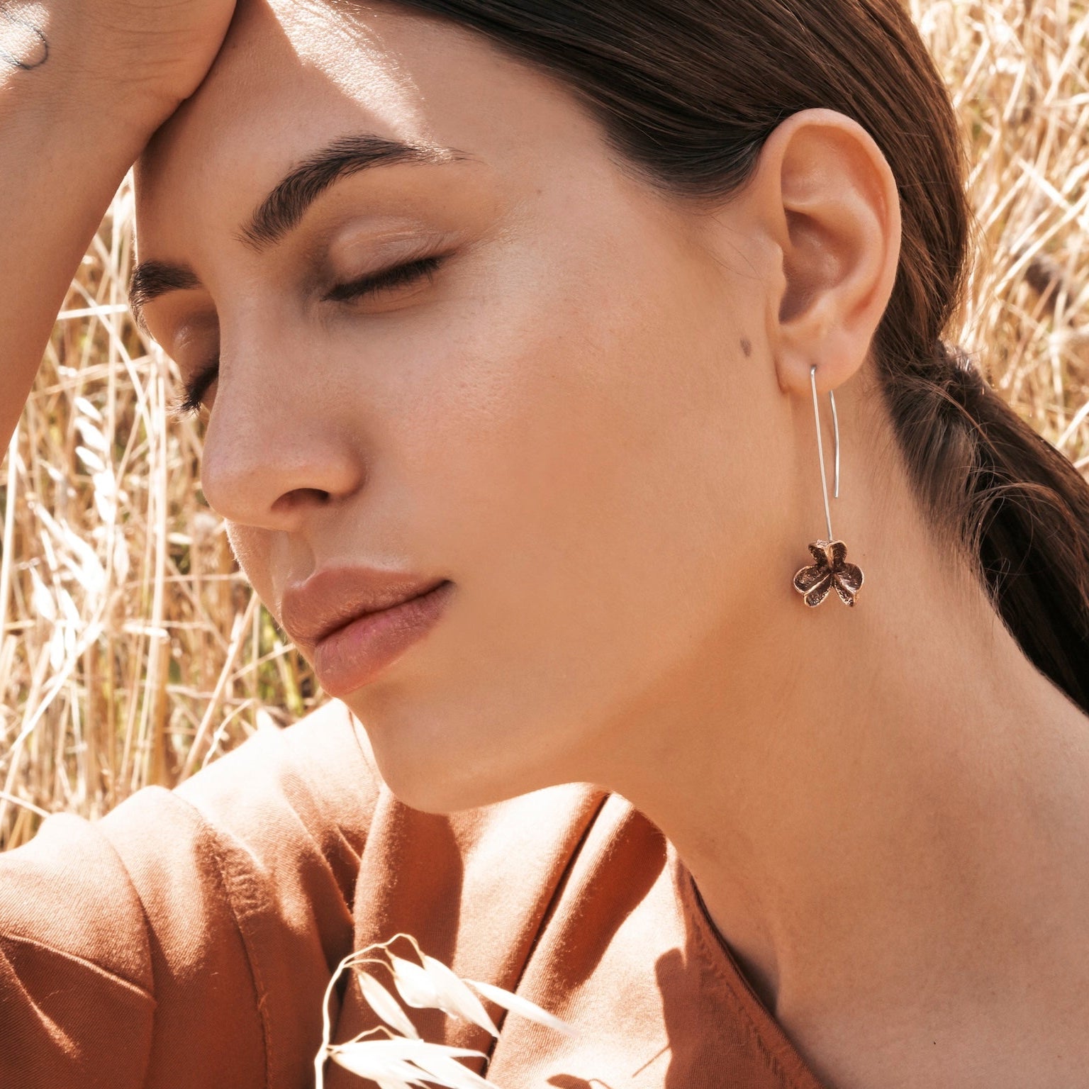 Small Spikethorn Long Hook Earrings on model by Tiffany Marx