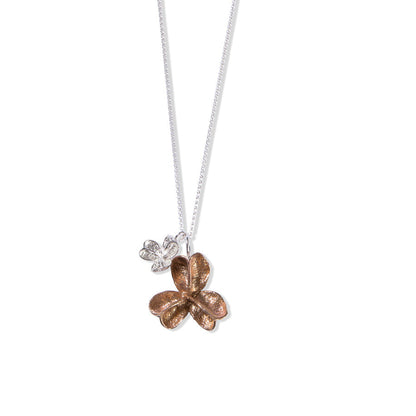 Larger bronze and smaller silver large spikethorn pendant 