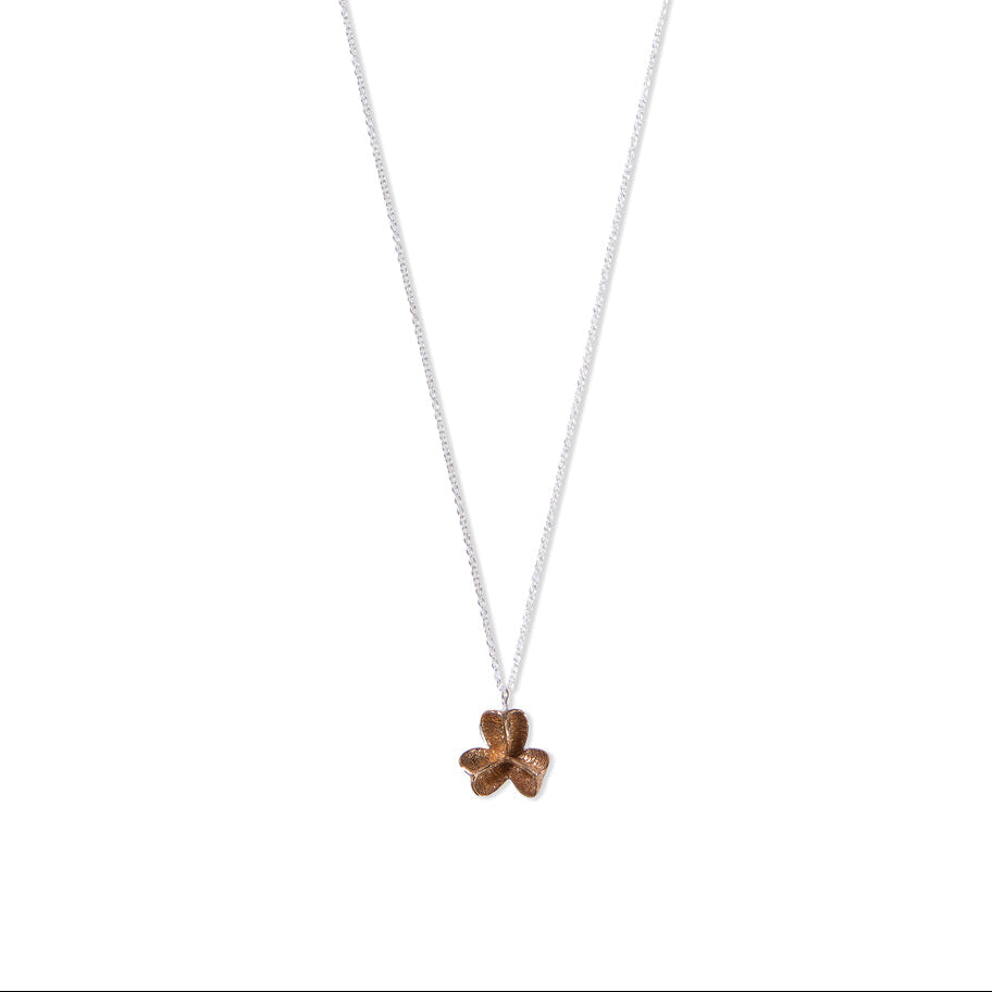 large bronze spikethorn pod pendant by Tiffany Marx on a silver chain