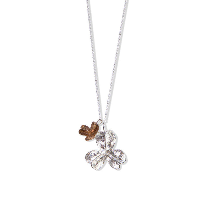 Larger silver and smaller bronze large spikethorn pendant 