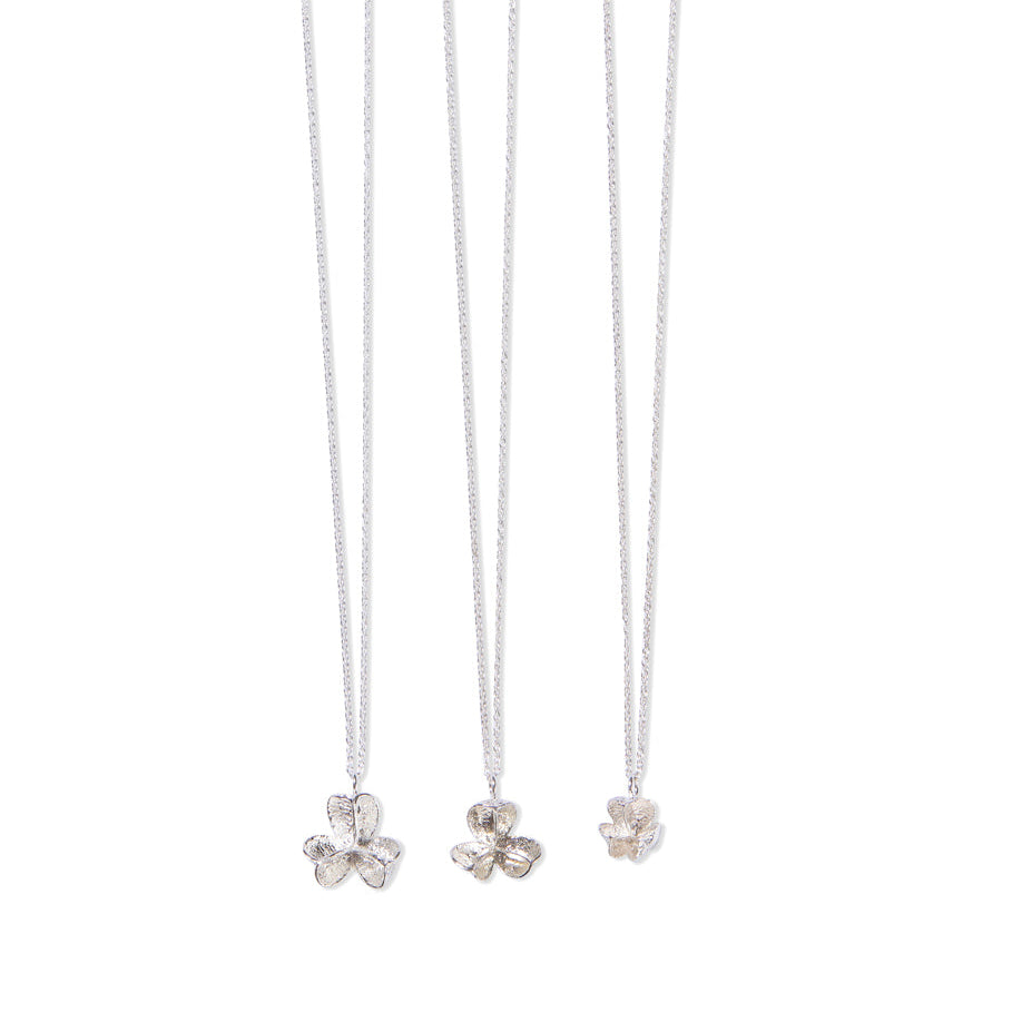 three different sizes of single silver spikethorn pendant by Tiffany Marx on a silver chain