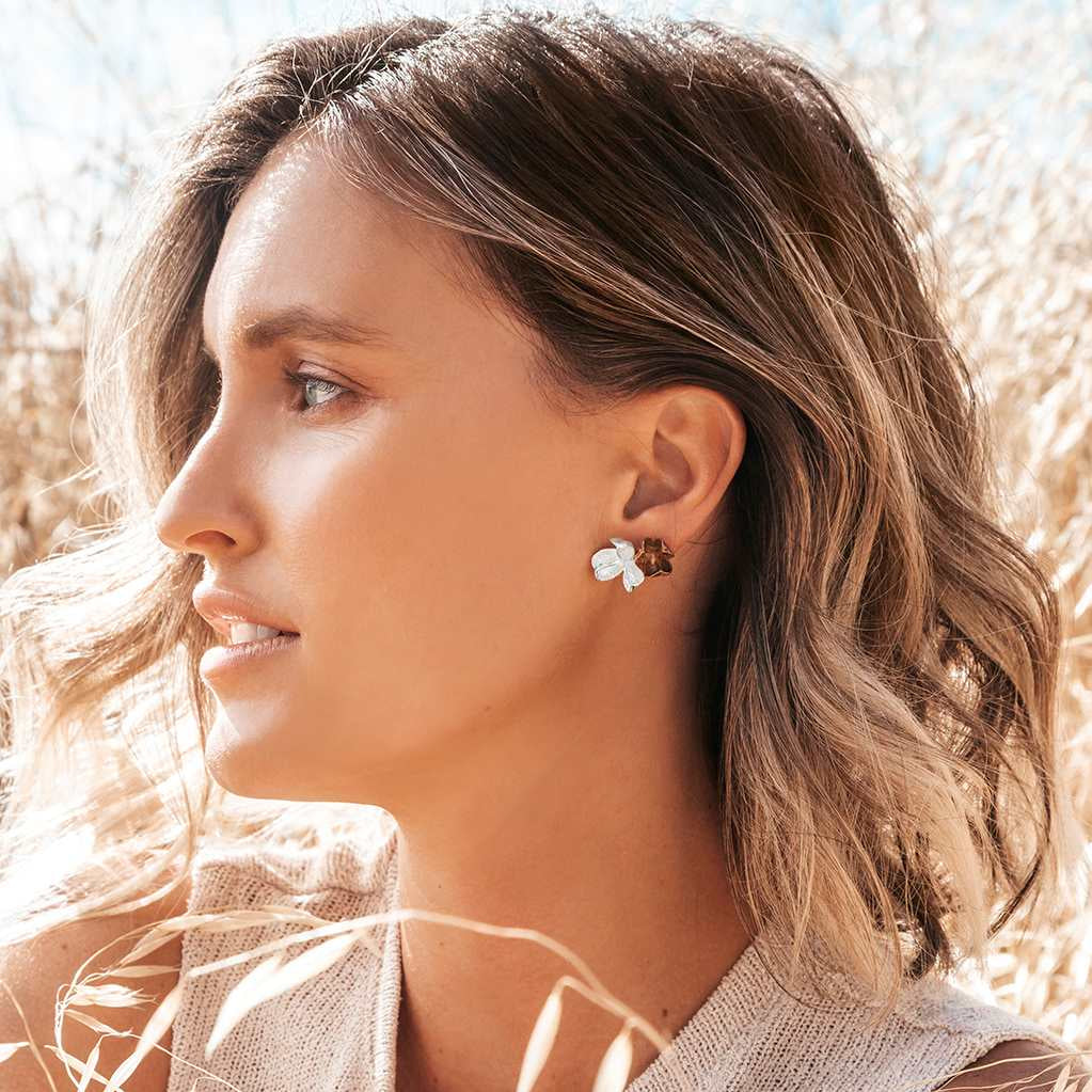 Large Silver Spikethorn Studs and Small Bronze Spikethorn Studs on Model by Tiffany Marx