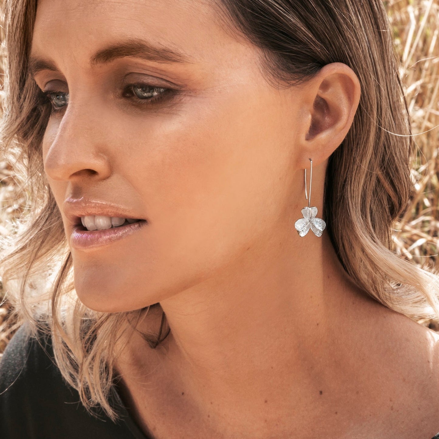 Small Spikethorn short Hook Earrings on model by Tiffany Marx